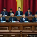 몬테네그로 정치 체제 - A detailed political scene inside Montenegro&rsquo;s parliament building, showcasing a diverse multi-party...