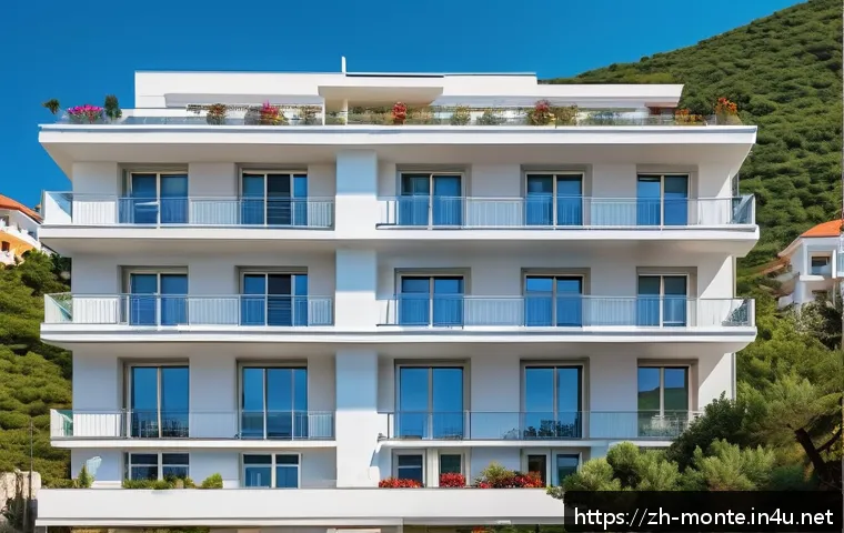 몬테네그로에서 집 구하는 법 - A modern coastal apartment complex in Montenegro during summer, showcasing sleek high-rise buildings...